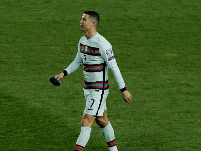 Cristiano Ronaldo left pitch and throws armband