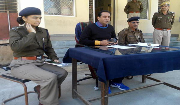 sp sirohi sandeep chauhan, in the middle, addressing the press