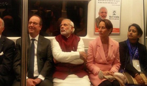 prime minister narendra modi and french president francois hollande take eco friendly metro ride to gurgaon