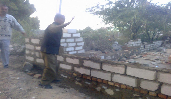 muncipal employee removing encroachment in khasra number 1218 on dated 6 january 2013