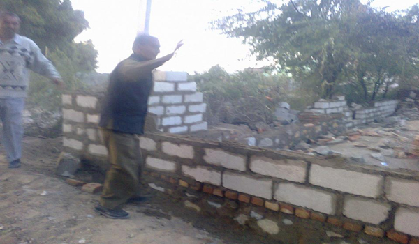 muncipal employee removing encroachment in khasra number 1218 on dated 6 january 2013