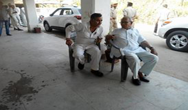 pukhraj gahlot seated outside the meeting room after row. file photo