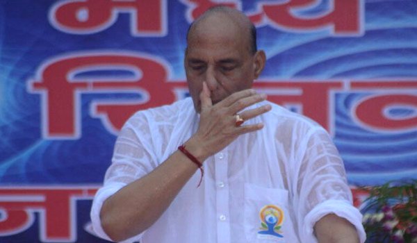 Rajnath Singh Braves rain to perform yoga in lucknow