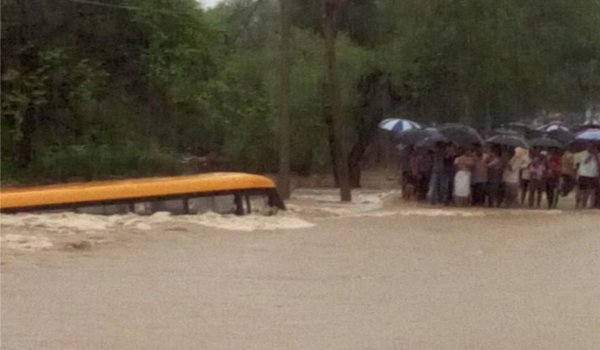 rajasthan : School bus drowned in flooded river