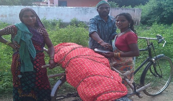 MP man carries mother in law body on bicycle as ambulance fails to turn up