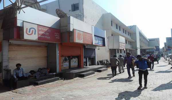 atm shutter down at kalupur railway station of ahmedabad
