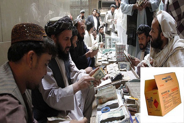 pakistani dealers exchange currency at a money
