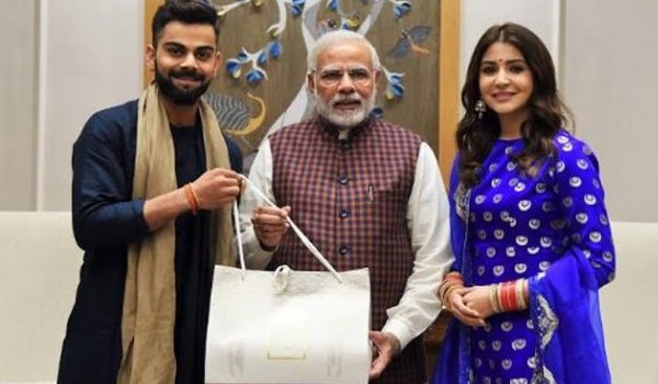 newly weds Virat Kohli and Anushka Sharma meet PM Modi