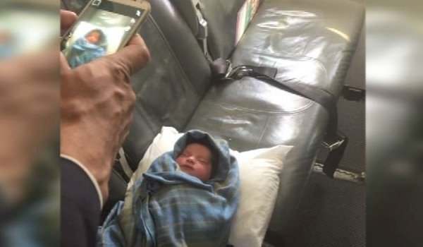 Woman gives birth to a baby girl mid flight