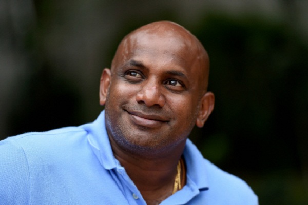 Sri Lankan cricketer Sanath Jayasuriya is forced to walk with crutch