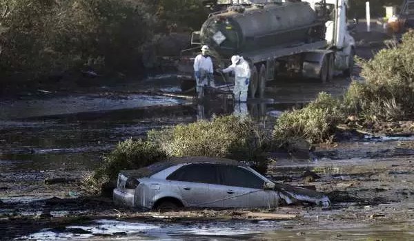 California community 'devastated' as mudslide death toll reaches 20