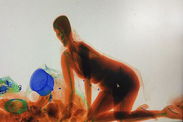 Because of this, the girl roamed inside the X-RAY MACHINE with the bag