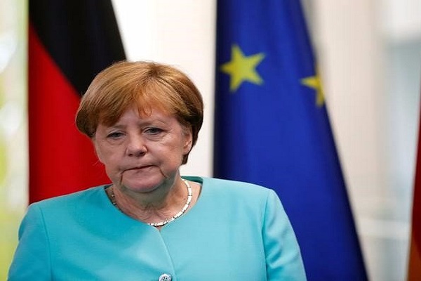 Germany Merkel warns against challenges to industries