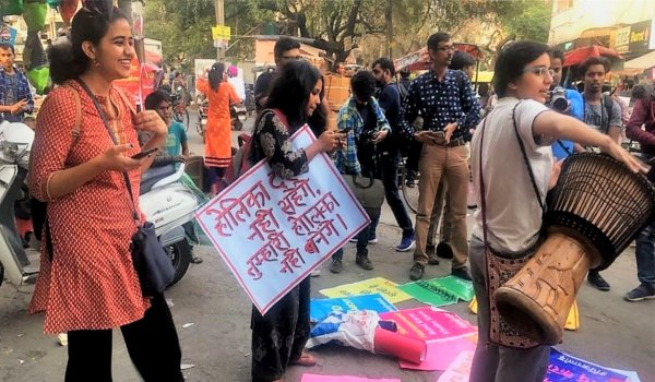 Holi semen-filled balloon attacks: DU students, teachers protest outside police headquarters