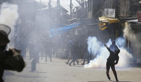 security force burst teargas shells as massive protests erupt in Srinagar