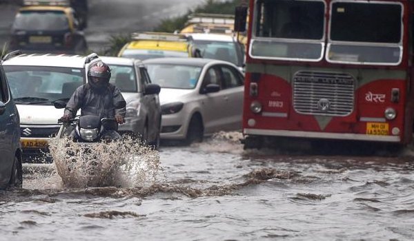 Mumbai rain: Four dead in 24 hours; trains and traffic hit in city