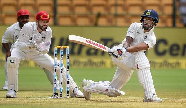 Shikhar Dhawan plays a shot during his splendid century