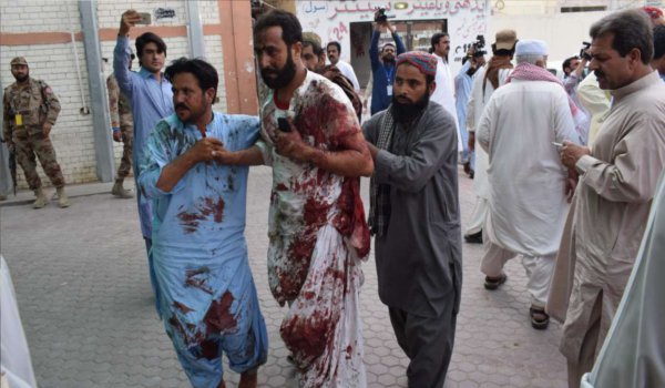 Pakistan attack: Suicide bomber 'kills at least 128 and leaves more than 150 injured' at election rally