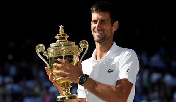 Novak Djokovic beats Anderson to win fourth Wimbledon title 