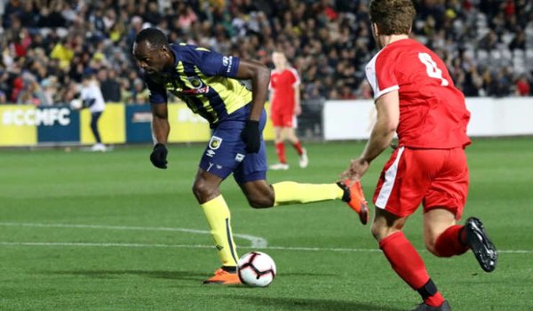 Usain Bolt makes football debuts for central coast Mariners in 6-1 win