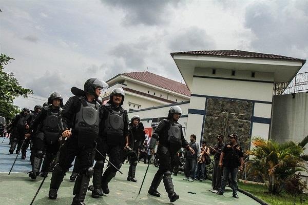 113 prisoners absconding in Indonesia jail, four arrested