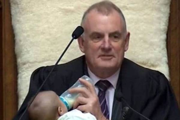 new zealand speaker cradles mps baby in parliament