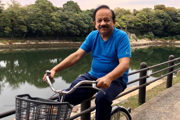 Welfare Minister Harsh Vardhan rides a bicycle in Japan