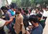 सिरोही मतगणना केन्द्र मे प्रवेश करते प्रत्याशियों के काउंटिंग एजेंट।