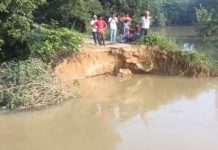 मधुबनी में महराजी बांध टूटा, लोगों ने घर के छतों पर ली शरण
