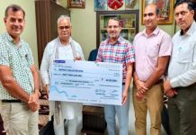 केंद्रीय भंडार निगम ने मदन दिलावर को सौंपा 44 लाख रुपए का चेक
