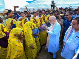अलवर में अमित शाह का ग्रामीण महिलाओं ने गीत गाकर किया स्वागत